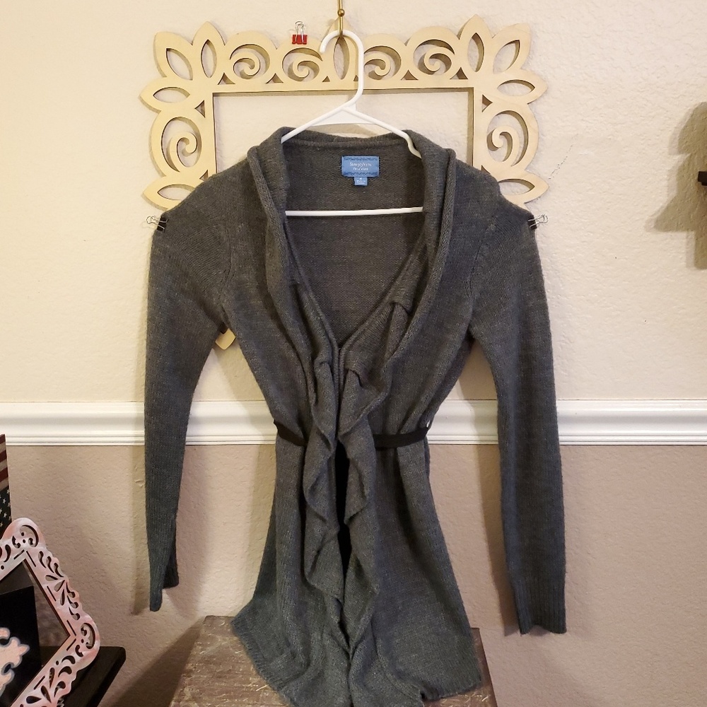 An open, dress sweater